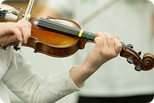 Student playing a violin